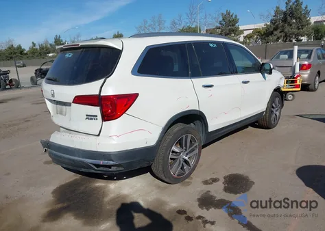 2018 Honda Pilot Touring z USA, uszkodzony, nr VIN 5FNYF6H98JB037825